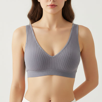 Gray ribbed tank top on a white background with decorative elements