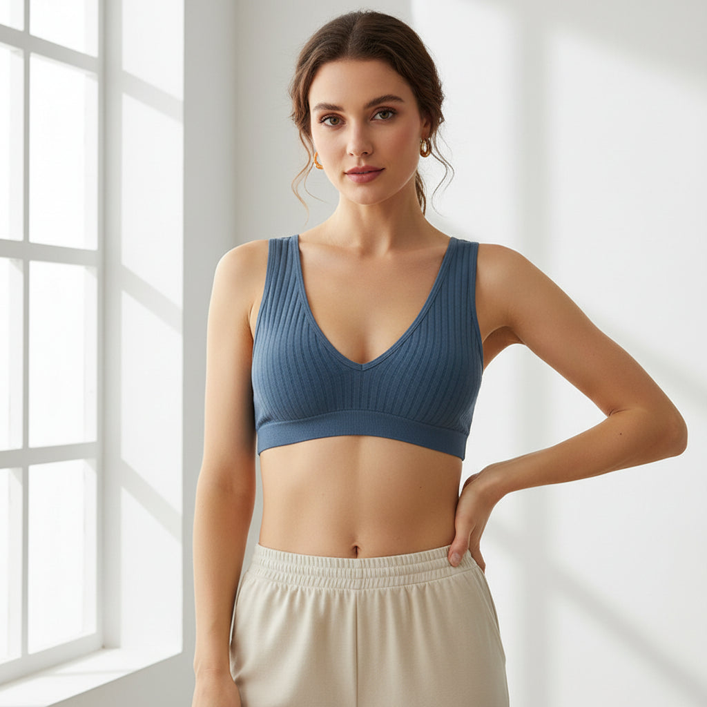 Blue ribbed bralette on a white background with small yellow stars