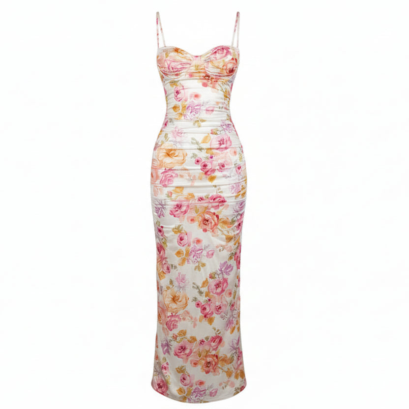 Woman wearing a floral strapless dress against a plain background