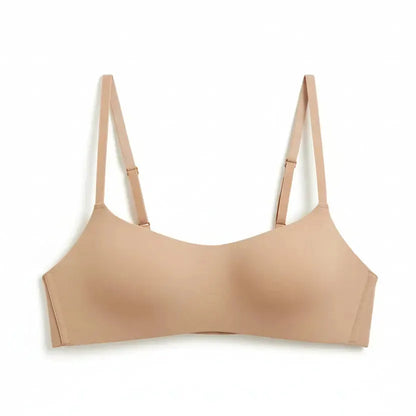 Beige bra on a white background