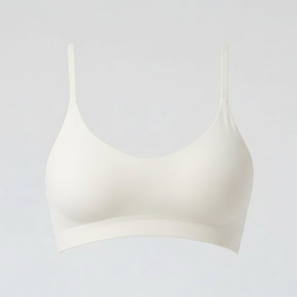 White bra on a light gray background