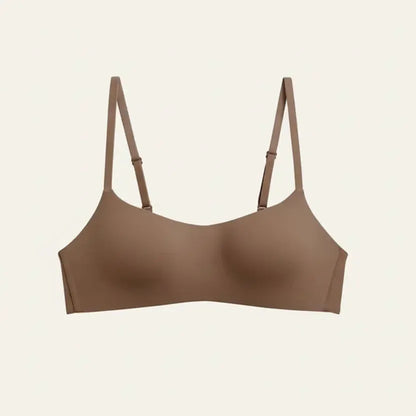 Brown bra on a light beige background