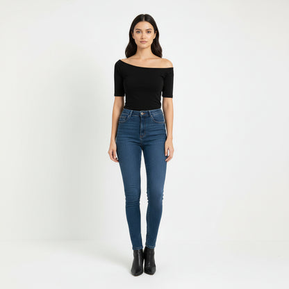 Black off-shoulder top on a white background