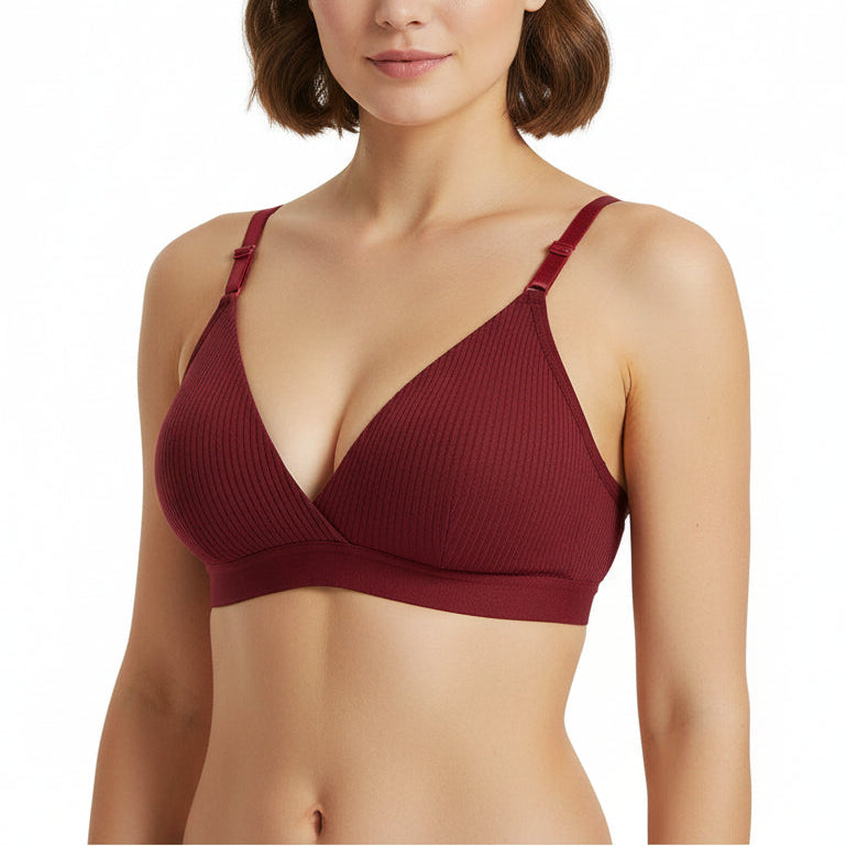 Red bra on a wooden hanger with a white background