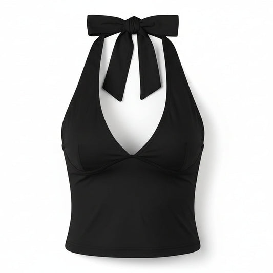 Pink halter top with tie straps on a white background